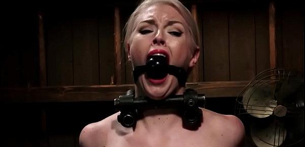  Chained blonde slave is set on Sybian